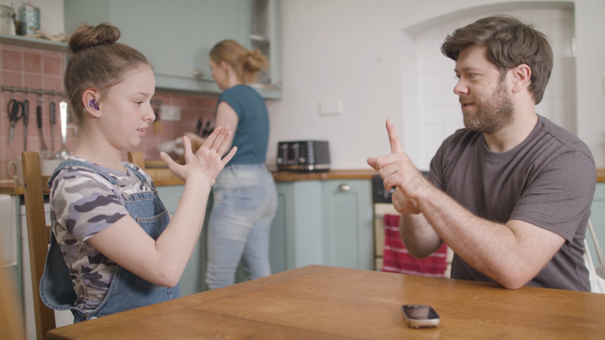 Family learning British Sign Language