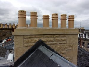 Refurbished chimney on top of roof