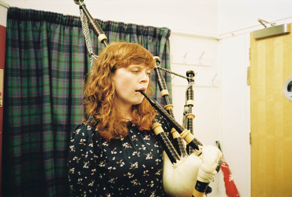 Woman playing the bagpipes