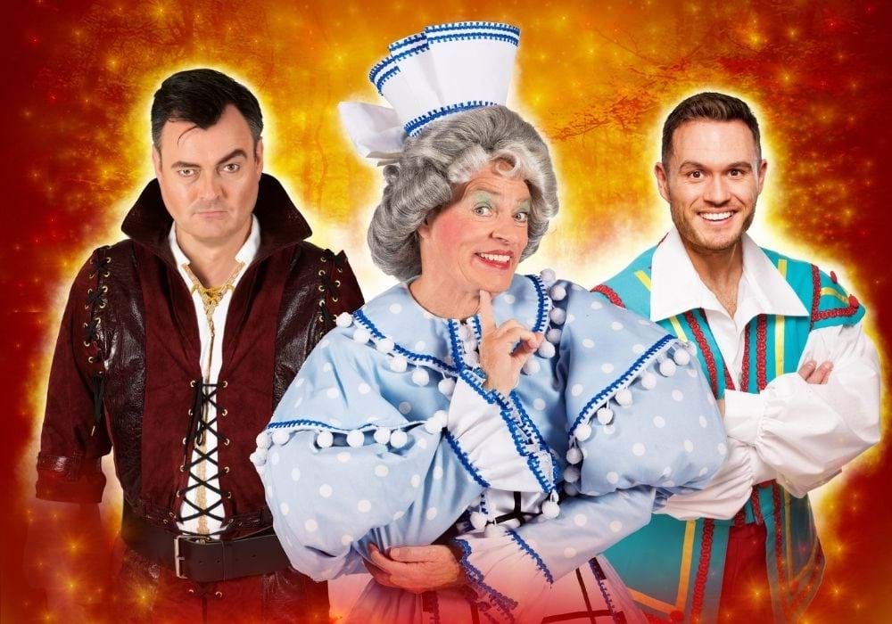 Three pantomime characters wearing costume